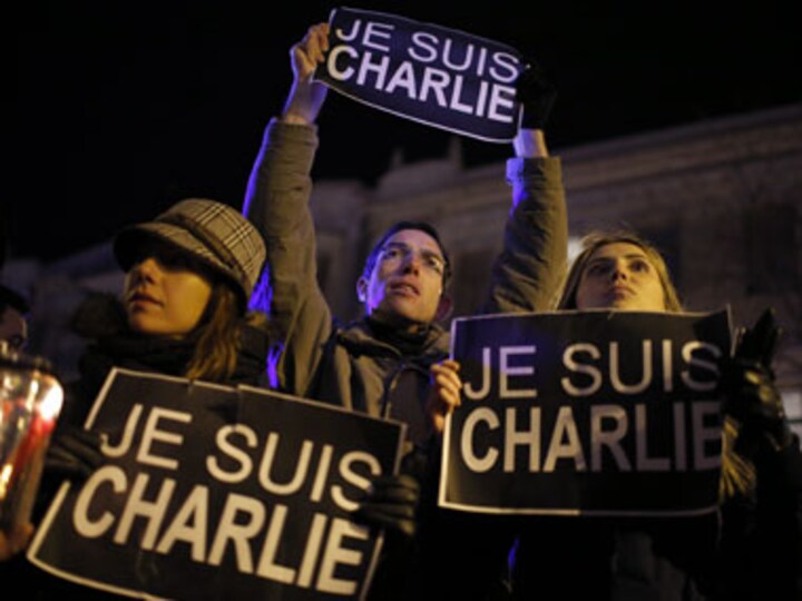 Prophet Mohammed holds Je Suis Charlie sign: New issue of Charlie Hebdo sells out in minutes