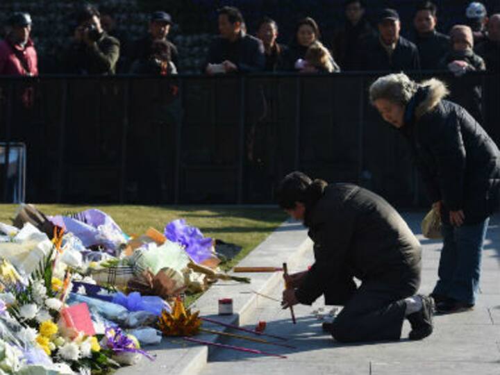Shanghai New Year's eve stampede leaves 36 dead, cause still not known