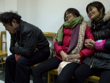 China: Families of Shanghai stampede victims grieve, seek answers China: Families of Shanghai stampede victims grieve, seek answers