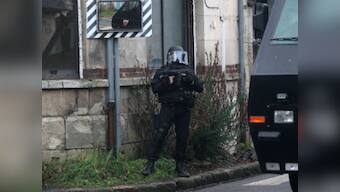 France deploys elite security forces as Charlie Hebdo attackers elude capture