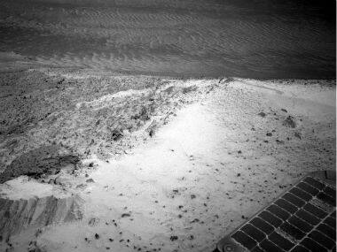 This image sent by NASA’s Opportunity rover on Wednesday, Jan. 7, 2015 shows a view from atop a Martian hill. AP