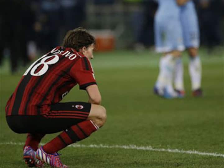 AC Milan's troubles mount after Cup defeat by 10-man Lazio