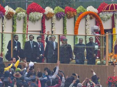 U.S. President Barack Obama and Indian Prime Minister Narendra Modi wave to the crowd at the end of India’s annual Republic Day parade in New Delhi. AP 