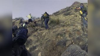 Two US police officers, who shot homeless camper charged with murder 