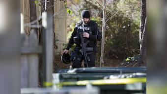 Two New York City police officers shot, wounded; hunt on for suspects 