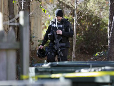 Two New York City police officers shot, wounded; hunt on for suspects  Two New York City police officers shot, wounded; hunt on for suspects