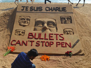 Sand artist Sudarsan Pattnaik creates sculpture to condemn Paris shooting Sand artist Sudarsan Pattnaik creates sculpture to condemn Paris shooting