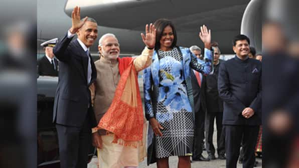 Orange pashmina shawl, pinstriped suit: Modi nearly steals Michelle's fashion thunder