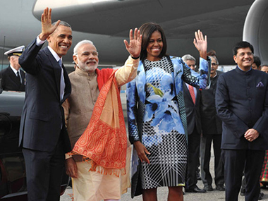 Orange pashmina shawl, pinstriped suit: Modi nearly steals Michelle's fashion thunder Orange pashmina shawl, pinstriped suit: Modi nearly steals Michelle's fashion thunder