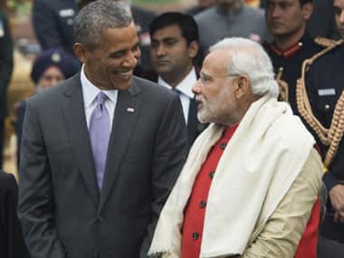Barack Obama with Narendra Modi. AFP.