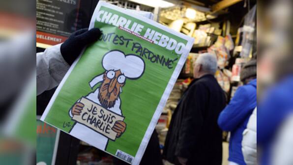 Gunman armed with military weapon takes hostages at post office near Paris but surrenders soon