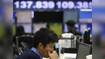 Asian shares tumble as oil price fall goes beyond expectations