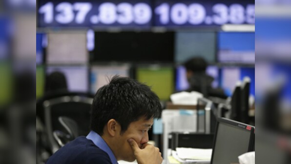 Asian shares tumble as oil price fall goes beyond expectations