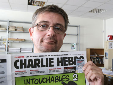 Paris: Gunmen attack French satirical magazine Charlie Hebdo, kill 12 Paris: Gunmen attack French satirical magazine Charlie Hebdo, kill 12