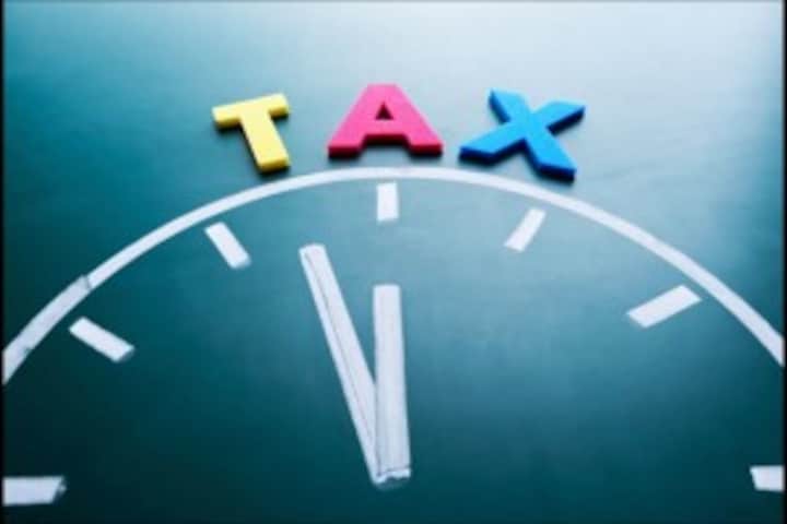 Union Budget 2015: FM to set limit for taxing indirect share transfer by MNCs Union Budget 2015: FM to set limit for taxing indirect share transfer by MNCs