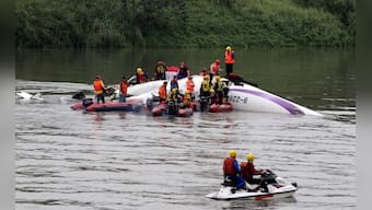 Photos: TransAsia plane crash lands in Taiwan river, 11 feared dead 
