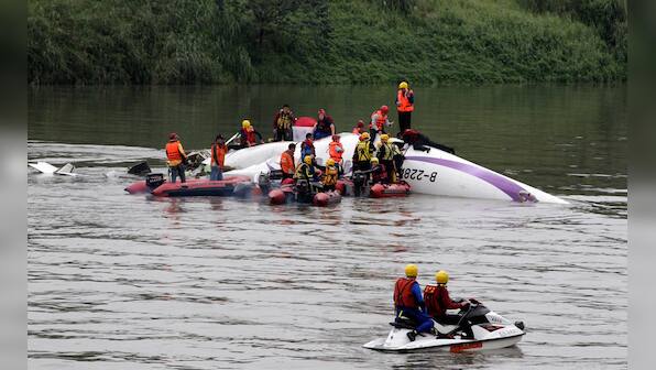 Photos: TransAsia plane crash lands in Taiwan river, 11 feared dead 