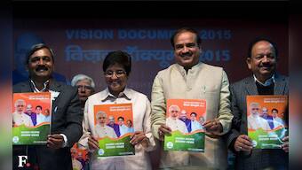 Photos: BJP leaders all smiles as Kiran Bedi unveils 'Vision 2015' for Delhi