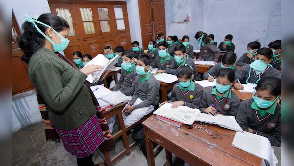 Masks in schools, on roads become a common sight as Swine flu spreads