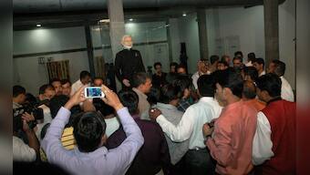 Photos: PM Modi's 'pin-stripe' suit goes under hammer, gets bid of Rs 1.21 cr on day one