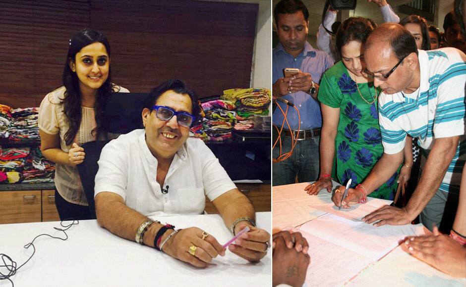 (L) Rajesh Juneja who bid Rs 1,21,11,111/- for Prime Minister Narendra Modi's pinstripe monogrammed bandhgala suit that he wore during US President Barack Obama's visit, at an auction in Surat on Wednesday. (R) An NRI Viral Choksi bids 1.11 Cr for Prime Minister Narendra Modi's pinstripe monogrammed bandhgala suit that he wore during US President Barack Obama's visit, at an auction in Surat on Wednesday. PTI