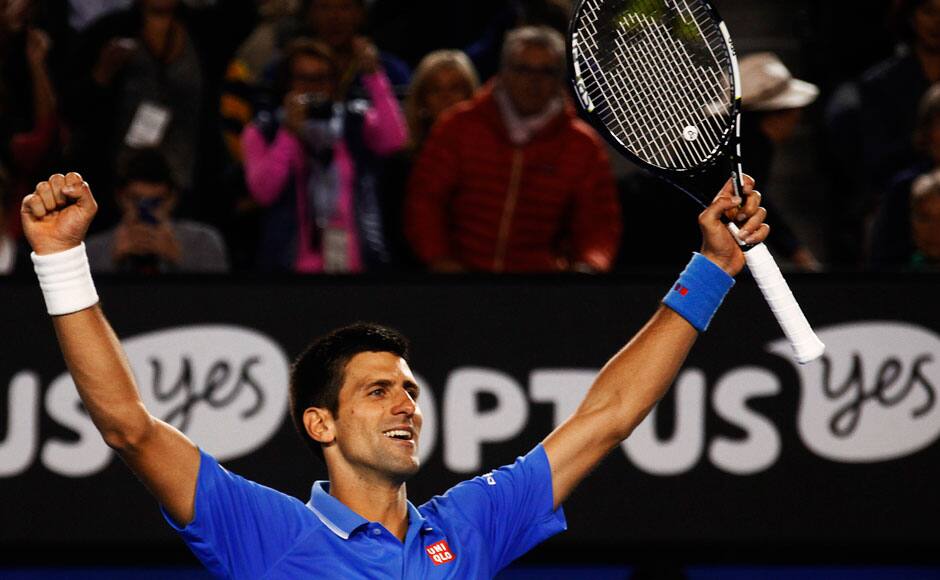 Novak Djokovic of Serbia celebrates after defeating Andy Murray of Britain in their men's singles final match at the Australian Open 2015 tennis tournament in Melbourne February 1, 2015. REUTERS