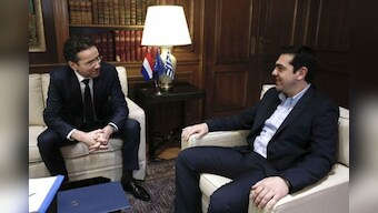 Greece seeks agreement on debt talks, reassure Europe as tensions rise