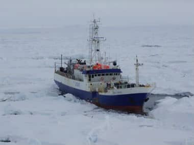 In this image provided by the U.S. Coast Guard the Austrailian fishing vessel the Antarctic Chieftain is seen from the the Coast Guard Cutter Polar Star as the cutter begins breaking up the ice around the vessel. AP 
