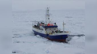 Rescuers reach fishing boat with 26 on board trapped in Antarctic ice 
