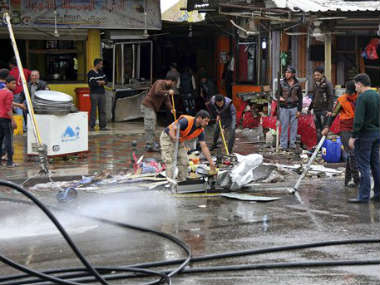 Suicide attack kills at least 12 in northern Baghdad Suicide attack kills at least 12 in northern Baghdad