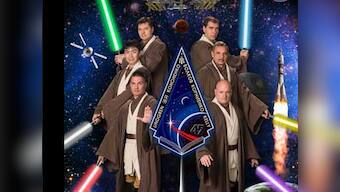 Nasa channels the Force: ISS astronauts pose for portrait with Jedi robes, lightsabers