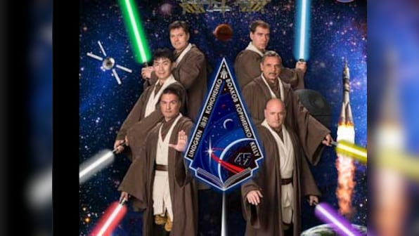 Nasa channels the Force: ISS astronauts pose for portrait with Jedi robes, lightsabers