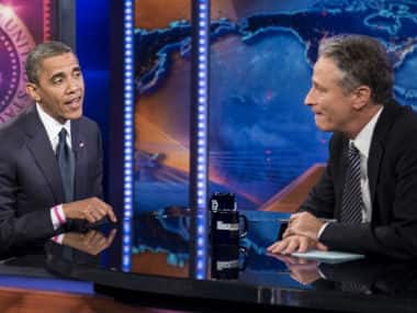 A 2012 file photo of Jon Stewart interviewing Obama on the show. AFP