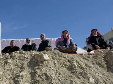 Relatives of slain Jordanian pilot, Lt. Muath al-Kaseasbeh attend the mourning ceremony at the Kaseasbeh tribe’s gathering divan at their home village of Ai, near Karak, Jordan. AP