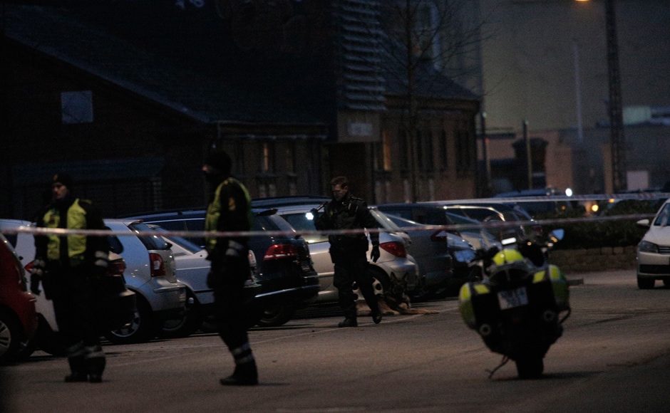 Police presence is seen at the site of the shooting in Copenhagen. A civilian died after shots were fired in a cafe at which controversial Swedish artist Lars Vilks attended a debate on art and blasphemy, the police said on Saturday. Reuters Police presence is seen at the site of the shooting in Copenhagen. A civilian died after shots were fired in a cafe at which controversial Swedish artist Lars Vilks attended a debate on art and blasphemy, the police said on Saturday. Reuters