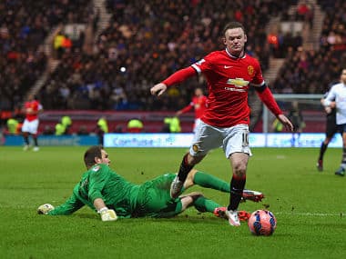 Wayne Rooney of Manchester United draws a foul from Thorsten Stuckmann of Preston North End to win a penalty during the FA Cup Fifth round match. Getty