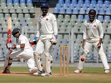 R Samarth of Karnataka plays a shot as he made 180 runs against Mumbai during their Ranji trophy match at Wankhade Stadium. PTI 