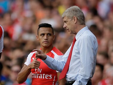 File picture of Alexis Sanchez (L). AP