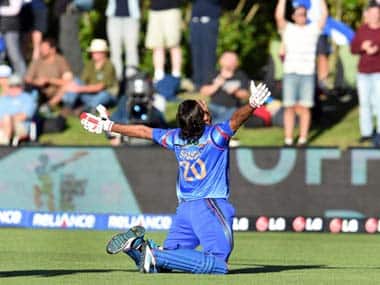 Shapoor Zadran celebrates after hitting the winning runs for Afghanistan. AFP