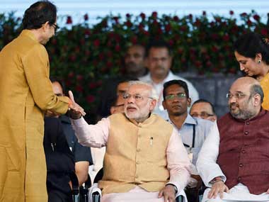 Uddhav Thackeray (left) with PM Narendra Modi (centre) and Amit Shah. Firstpost
