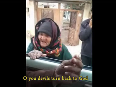 Watch: Old lady scolds men suspected to be Islamic State militants Watch: Old lady scolds men suspected to be Islamic State militants