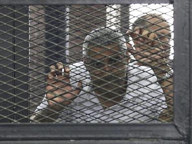Egypt could free jailed journalist Fahmy within hours, says Al Jazeera Egypt could free jailed journalist Fahmy within hours, says Al Jazeera