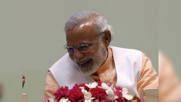 Modi needs to come out of his flashy suit: PM Seeks humble, tolerant new image after Delhi poll rout