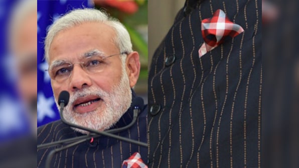 Surat auction: Modi's suit steals the show, T-shirt gifted by Brett Lee ignored