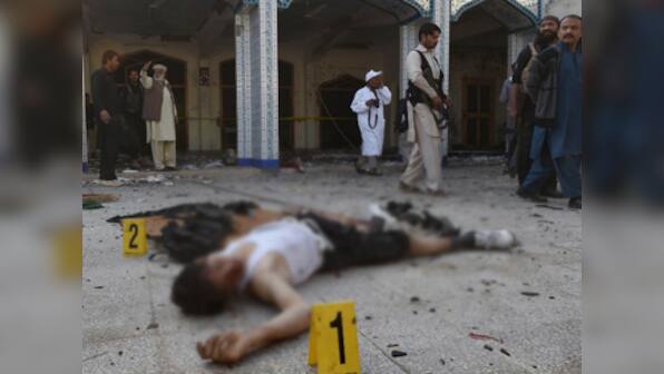 Pakistan: Taliban suicide bombers storm Shia mosque in Peshawar, kill 20