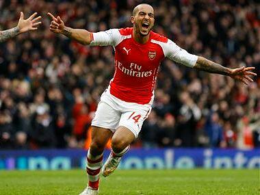 Arsenal's Theo Walcott celebrates scoring a goal. AP