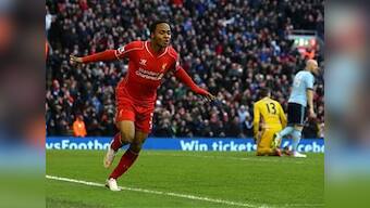 Sterling, Coutinho strike late to send Liverpool through