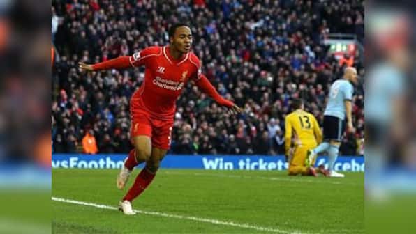 Sterling, Coutinho strike late to send Liverpool through