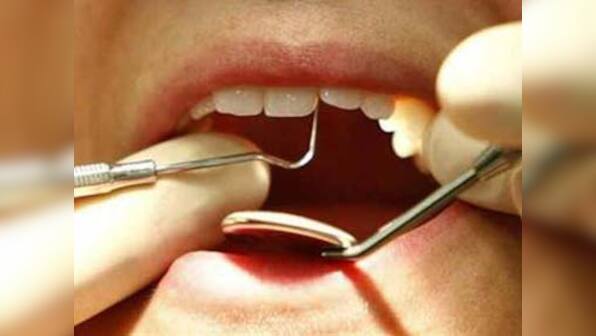 Woman dies after Indian-origin dentist extracts 20 teeth in one go, charged with homicide