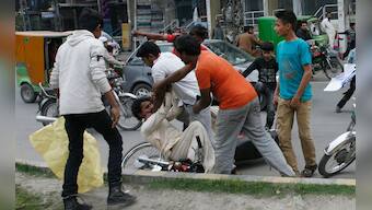 Christians riot in Lahore after twin bombings at churches leave 10 dead